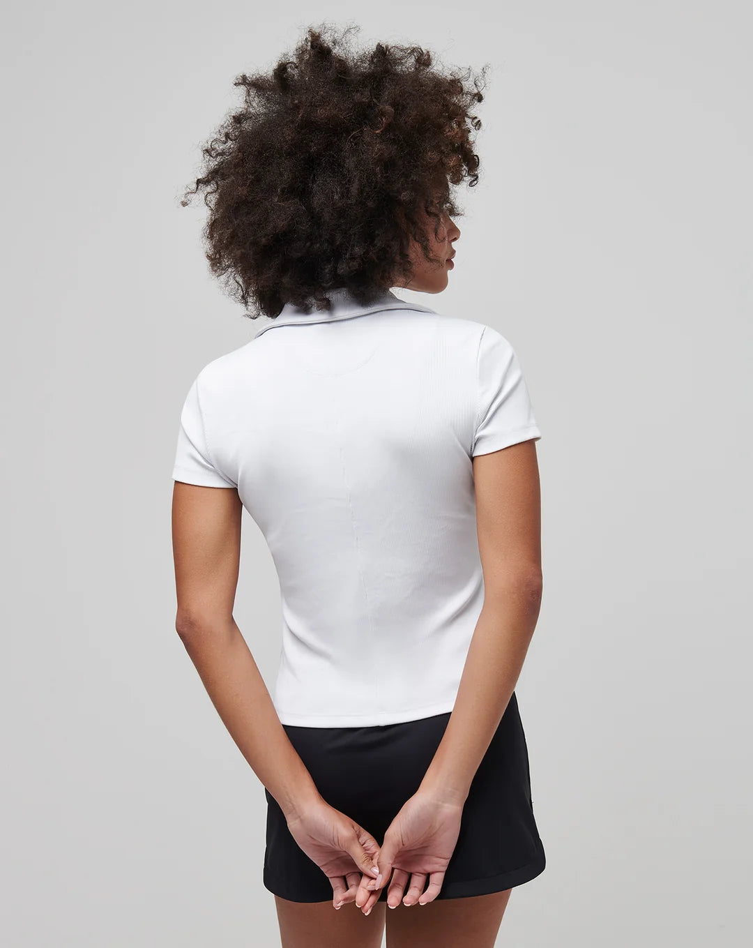 TravisMathew Moveknit Short Sleeve V-Neck Polo
